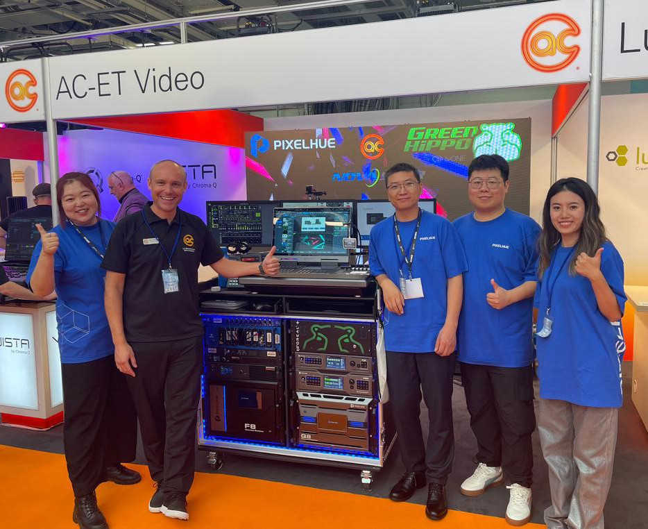 Stuart Burdett of AC-ET pictured with the PIXELHUE team at their stand at PLASA 2023